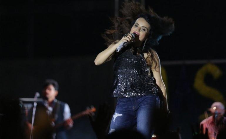 Singer performing live on stage